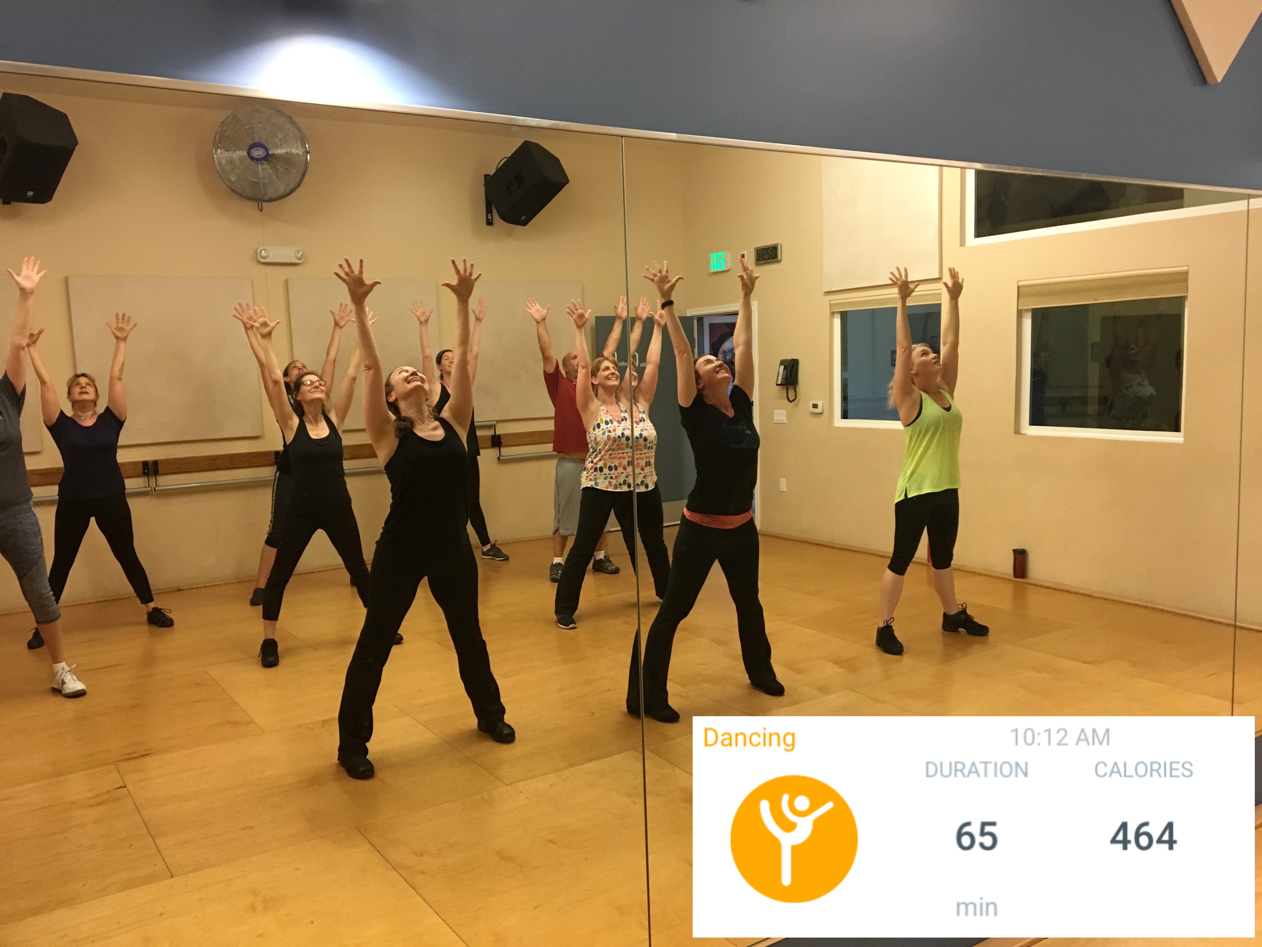 An uplifting moment from Jeanne Simpson's <i>Choreo-bics</i> class”/><figcaption>An uplifting moment from Jeanne Simpson’s <i>Choreo-bics</i> class</figcaption></figure>
<p>So far, we’ve been learning numbers from <i>Hairspray</i>, <i>Singing in the Rain</i>, <i>Fosse</i>, and <i>West Side Story,</i> in the style of choreographers Bob Fosse, Jerome Robbins, Gene Kelly, and Jerry Mitchell. Once we get the dance steps down, we progress to dancing the steps as a specific character from the show. For example, during one class my students transform into chorus girls from the 1920s, and in another, gang members from the 1950s.</p>
<p>I have students who have danced in multiple Broadway shows, and others who have never been to a dance class before, so I take the Broadway numbers and choreograph my own versions, incorporating a few steps from the original dances plus my own steps that teach the essence of each choreographer’s style. Some of my students have said that learning each dance is like learning a new language, because each choreographer’s style of movement is so unique and specific.</p>

<figure class=