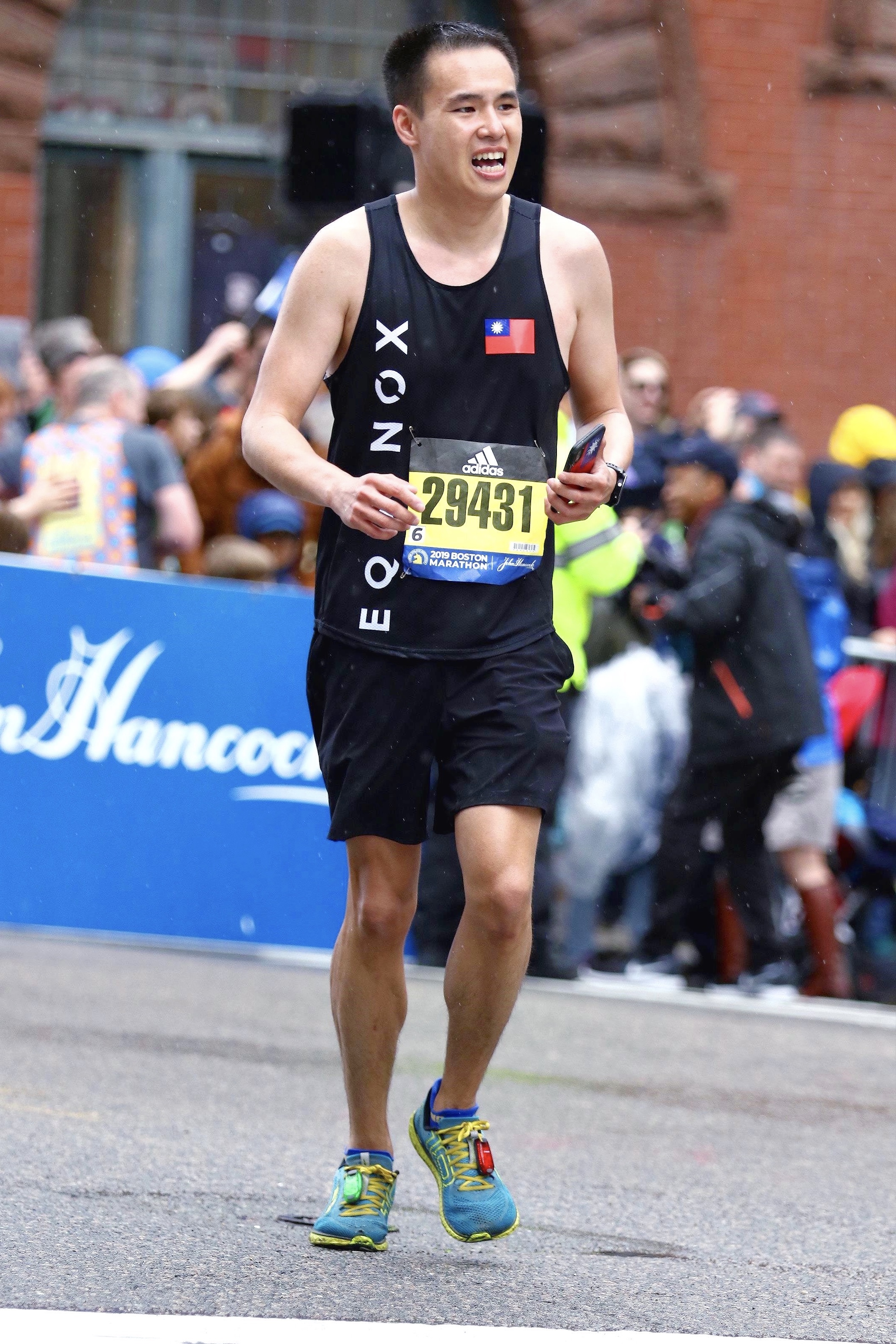 Olly running the Boston Marathon with Team Equinox.